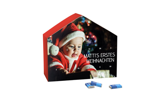 Adventskalender in Haus-Form mit share-Schokolade